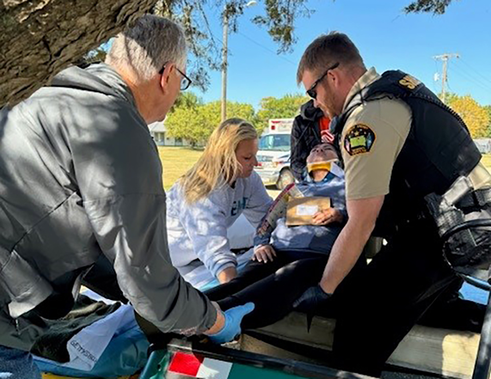 Crews tend to a patient during a mock disaster drill