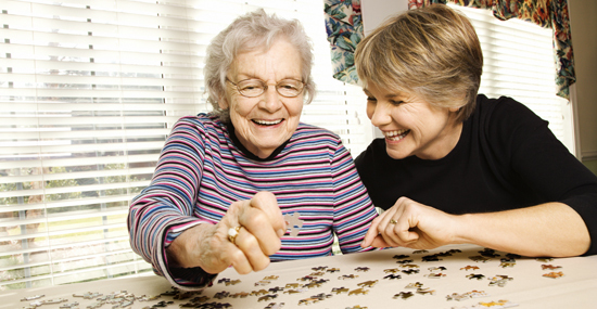 Women putting together a puzzle