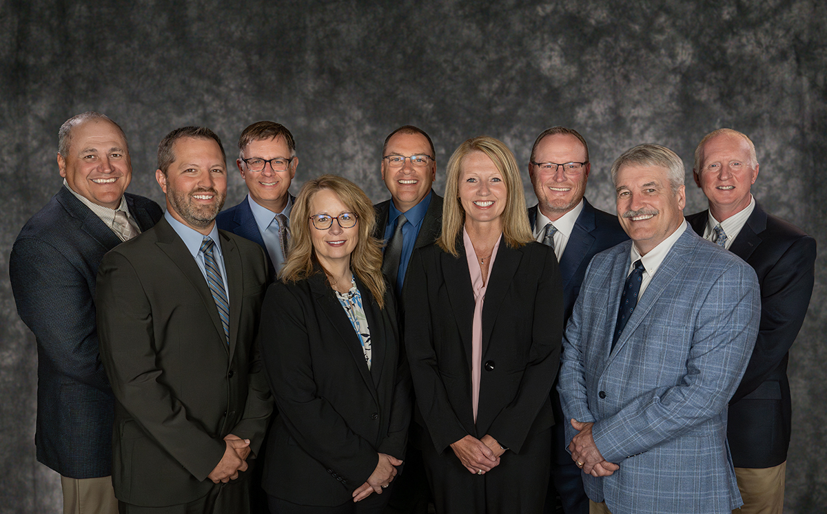 The SDN Communications Board of Managers pose for a photo.