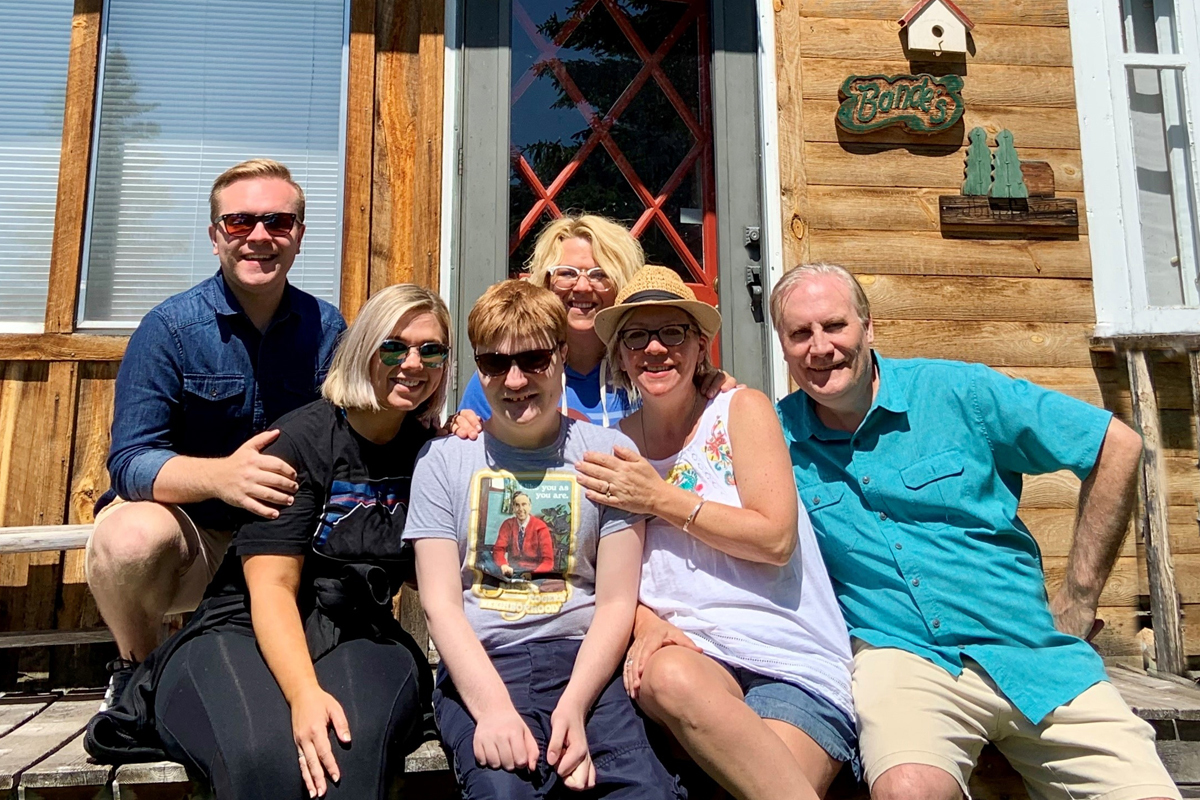 Brian Bonde's family in front of their cabin in Rochford