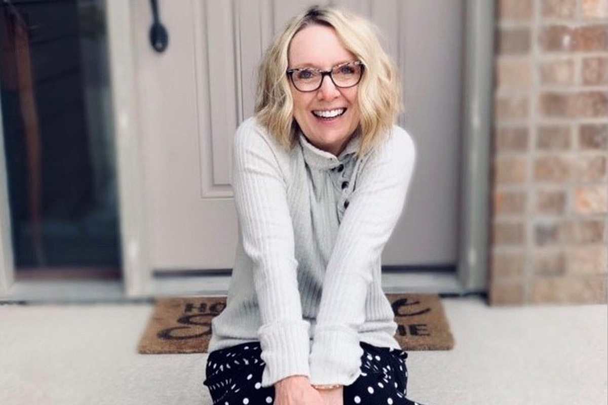 Elizabeth Hagen sitting on her front step