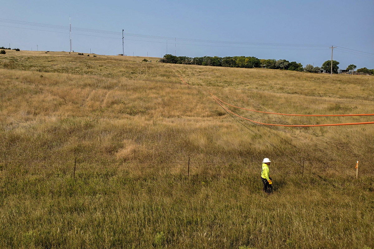 conduit for fiber being pulled across a large rural field