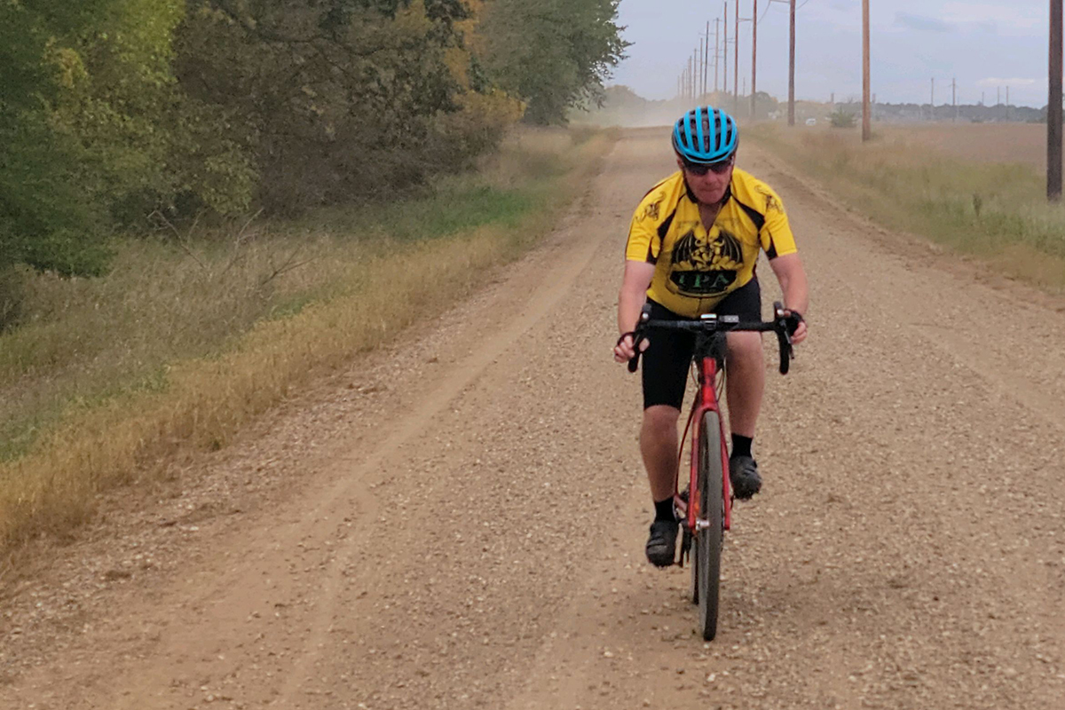 SDN Communications sales engineer Gary Fischer riding a bike