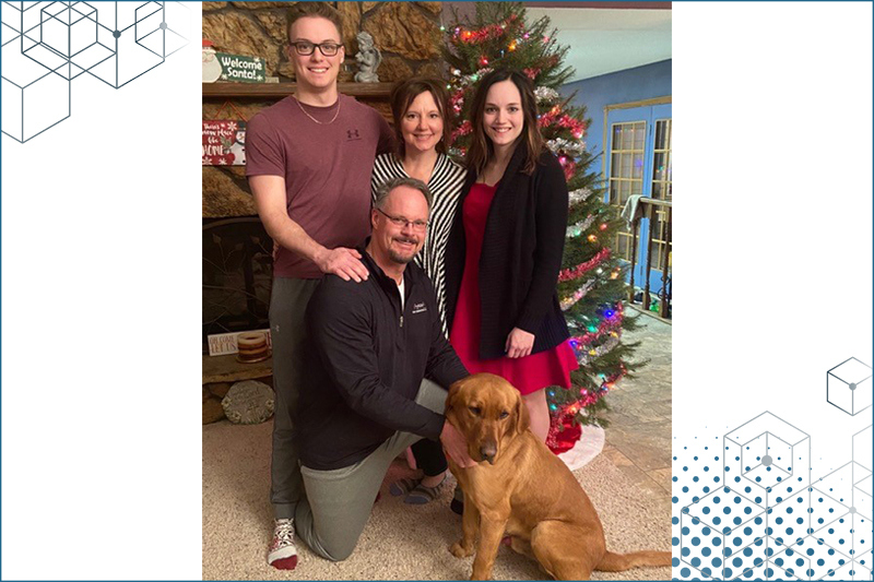 Greg Robinson with his wife, son, daughter and family dog