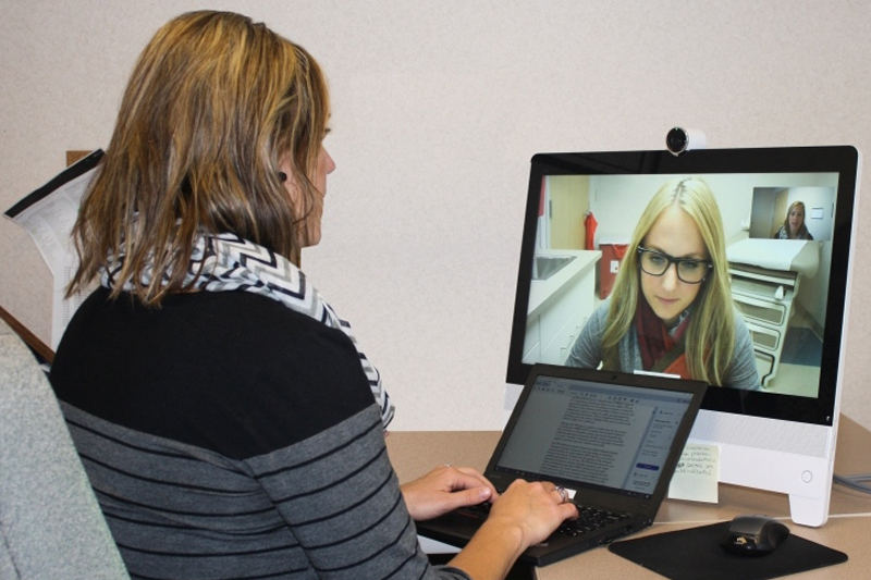 Horizon Health Care facility professional holding video meeting with a person