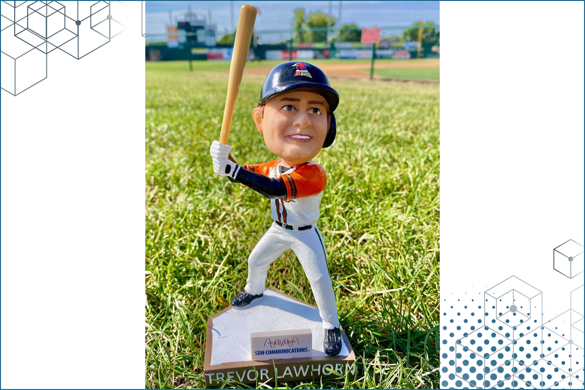 Trevor Lawhorn bobblehead doll on the Canaries ball field