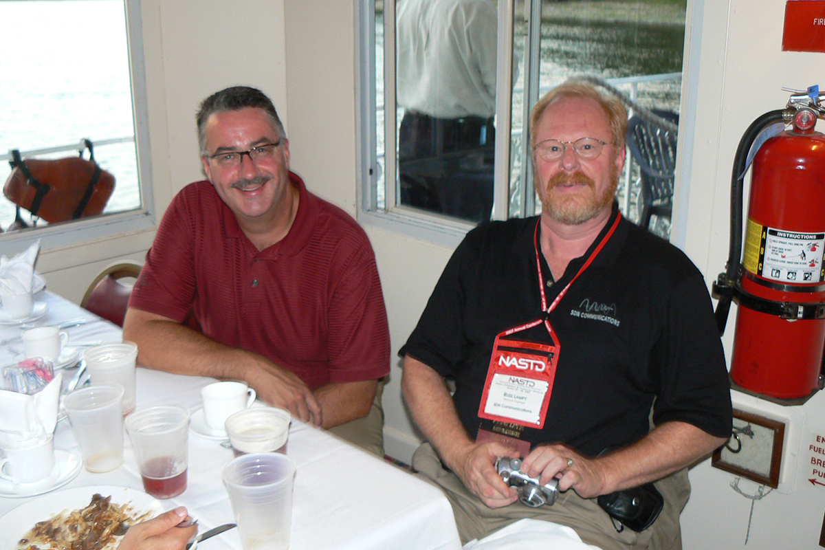 Former SDN Communications CEO Mark Shlanta is shown with sales engineer Russ Lampy