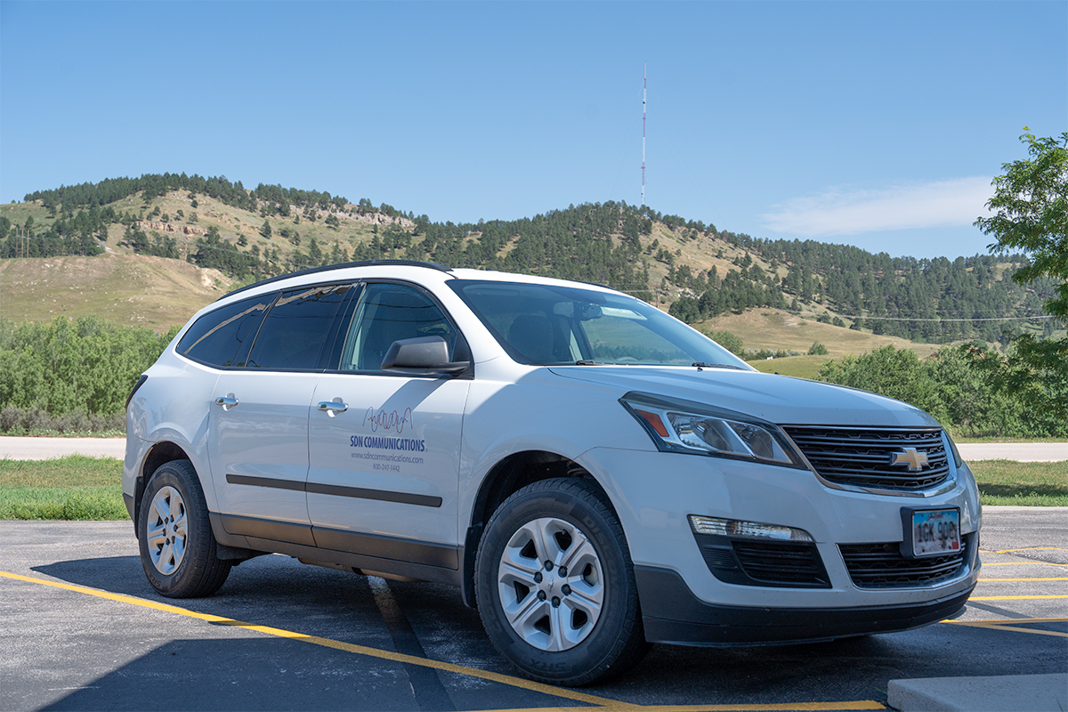 An SDN Communications vehicle in front of the Rapid City office