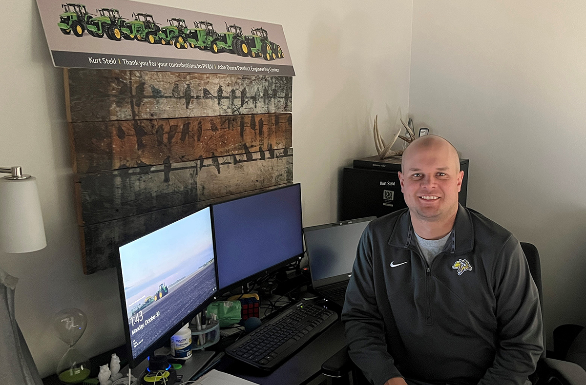Kurt Stekl is pictured in front of his work-from-home office in Letcher, South Dakota
