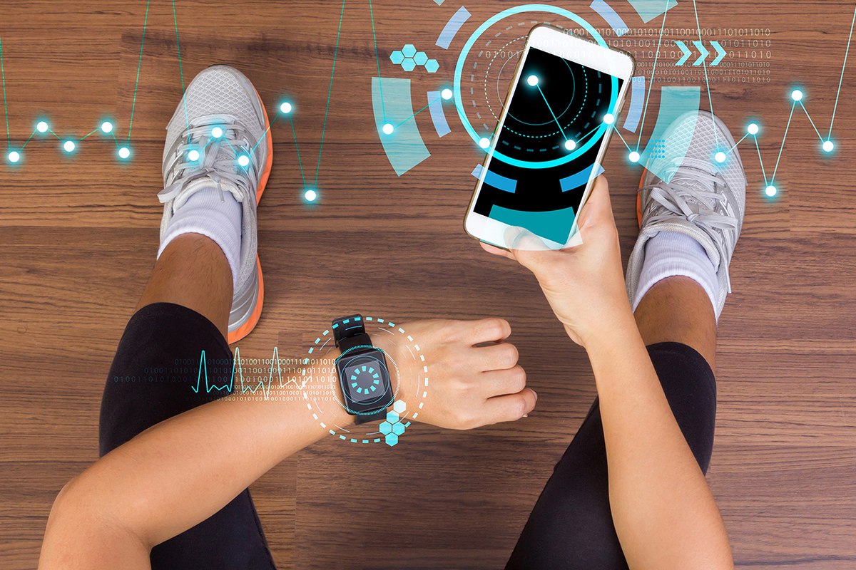 athlete's smart watch syncing with smart phone