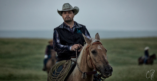 Zach Ducheneaux Riding A Horse - photo by Chris Dickinson