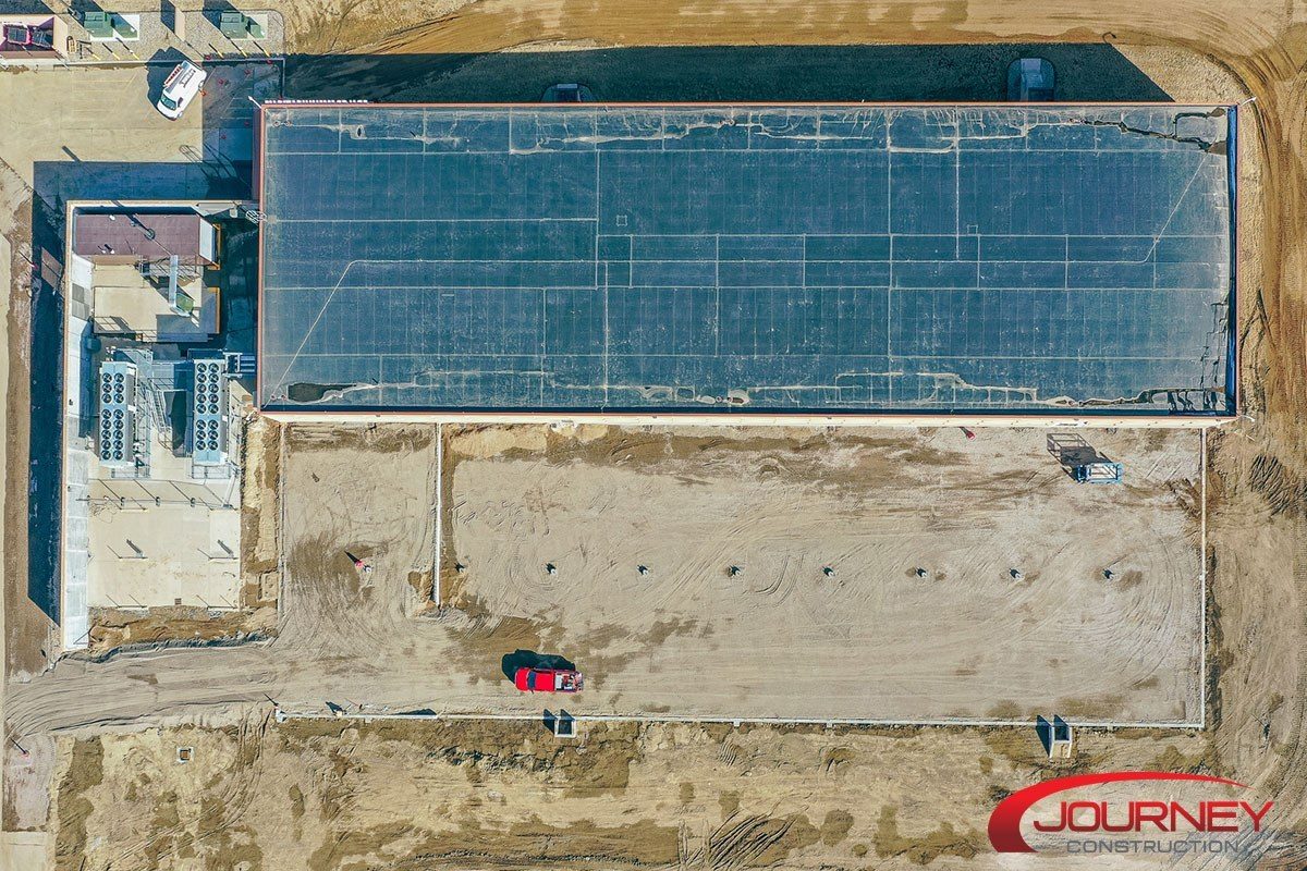 Aerial image of data center with footings for expansion