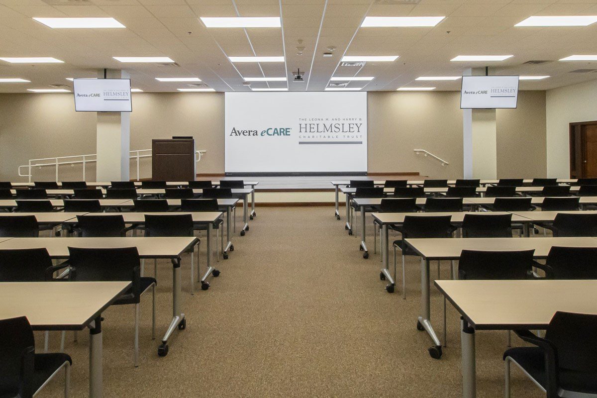 Classroom seating and presenter podium for Avera eCARE Helmsley Education Center
