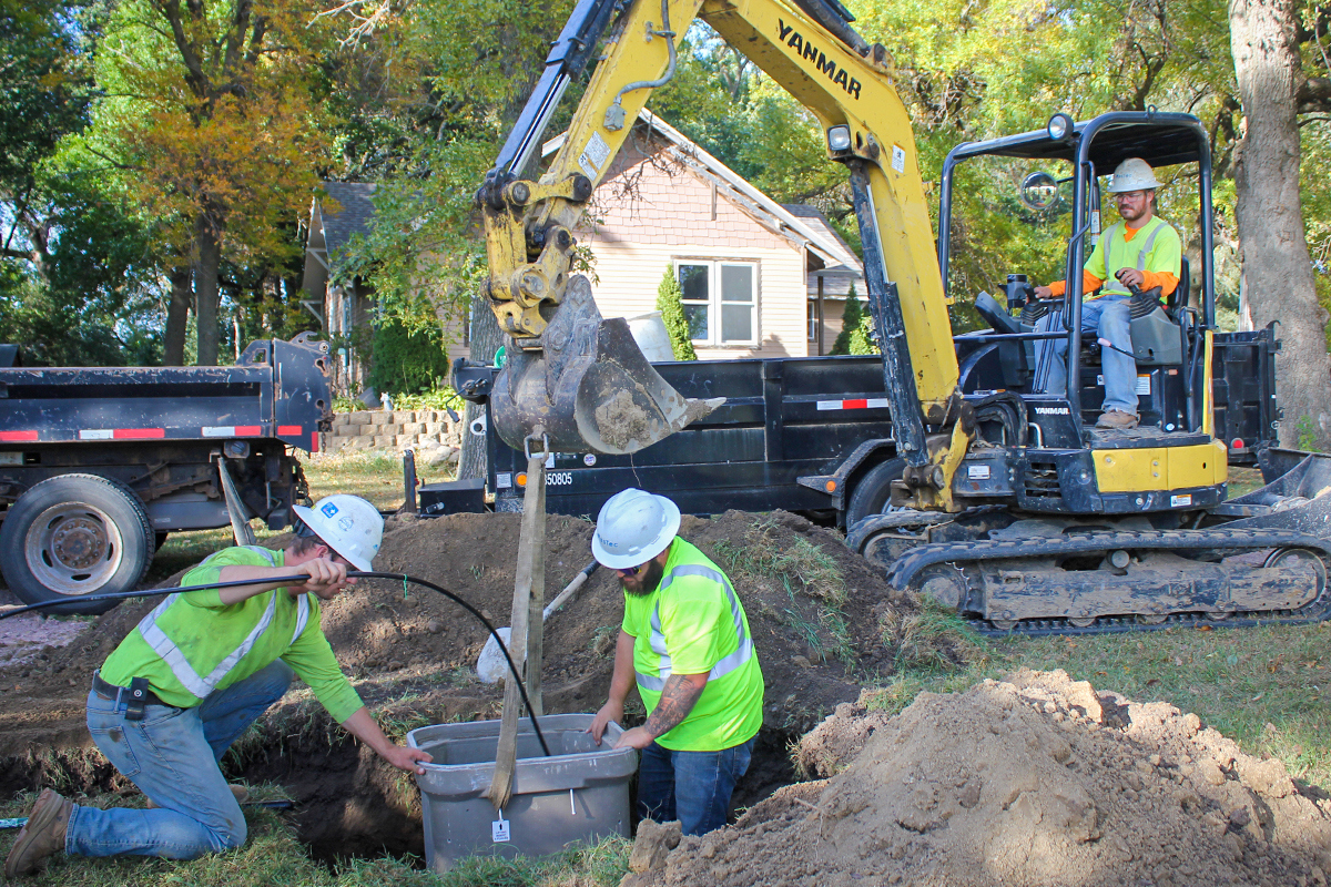 crews install fiber to the home at a rural home near Dell Rapids