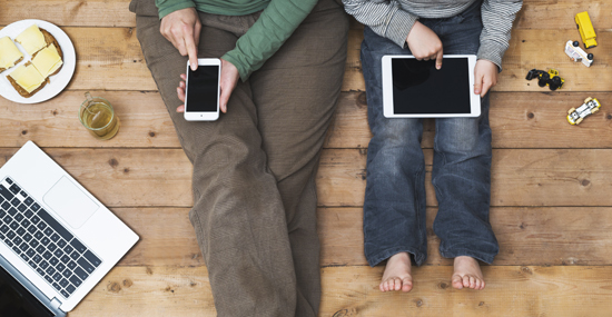 family using internet on devices