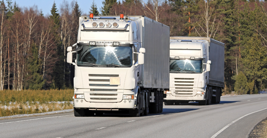 semi trucks platooning on highway