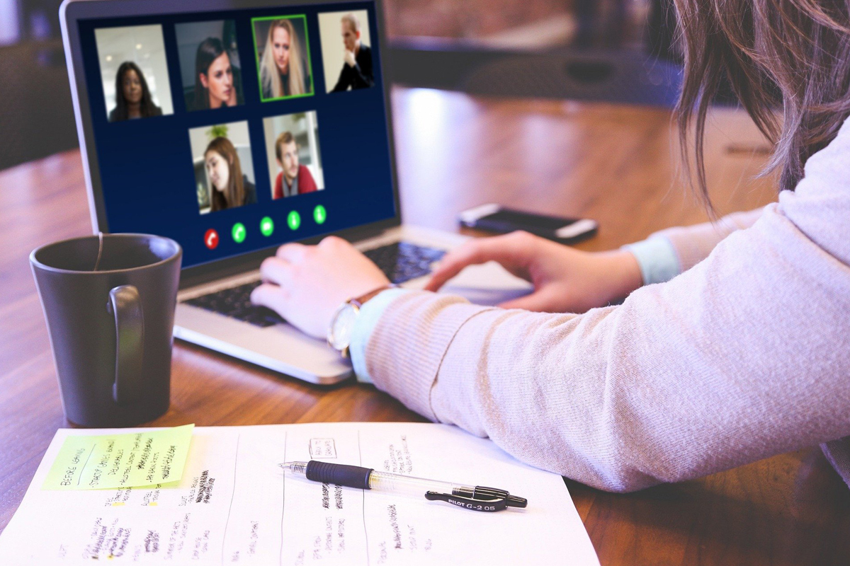 person on video meeting via computer